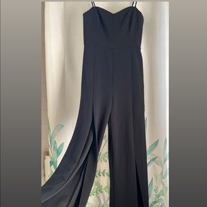 *BRAND NEW* BEBE Jumpsuit with leg slits: Size Medium